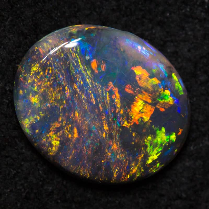 0.52 ct black opal 7.3x6.2x1.9mm