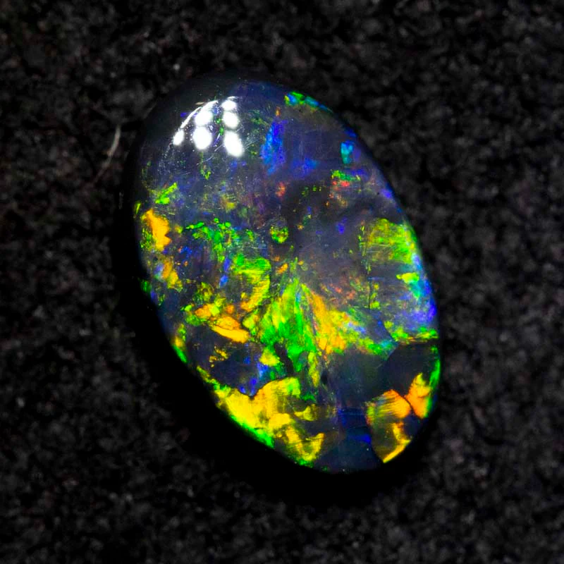 0.52 ct black opal 7.4x4.8x2.3mm