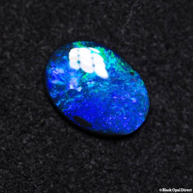 0.52 ct black opal 7.5x5.5x1.5mm