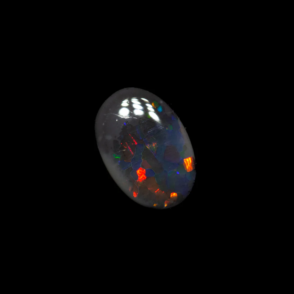 0.52 ct black opal 7x4.8x2.1mm