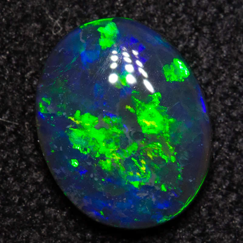 0.52 ct black opal 7x5.6x2mm