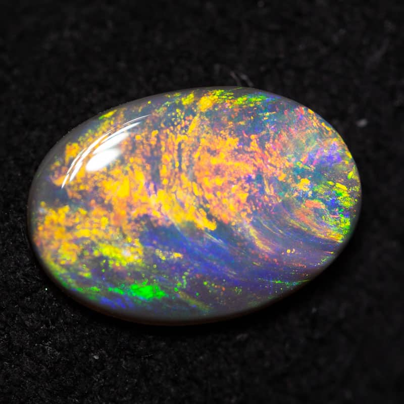 0.52 ct black opal 8.2x5.7x1.7mm