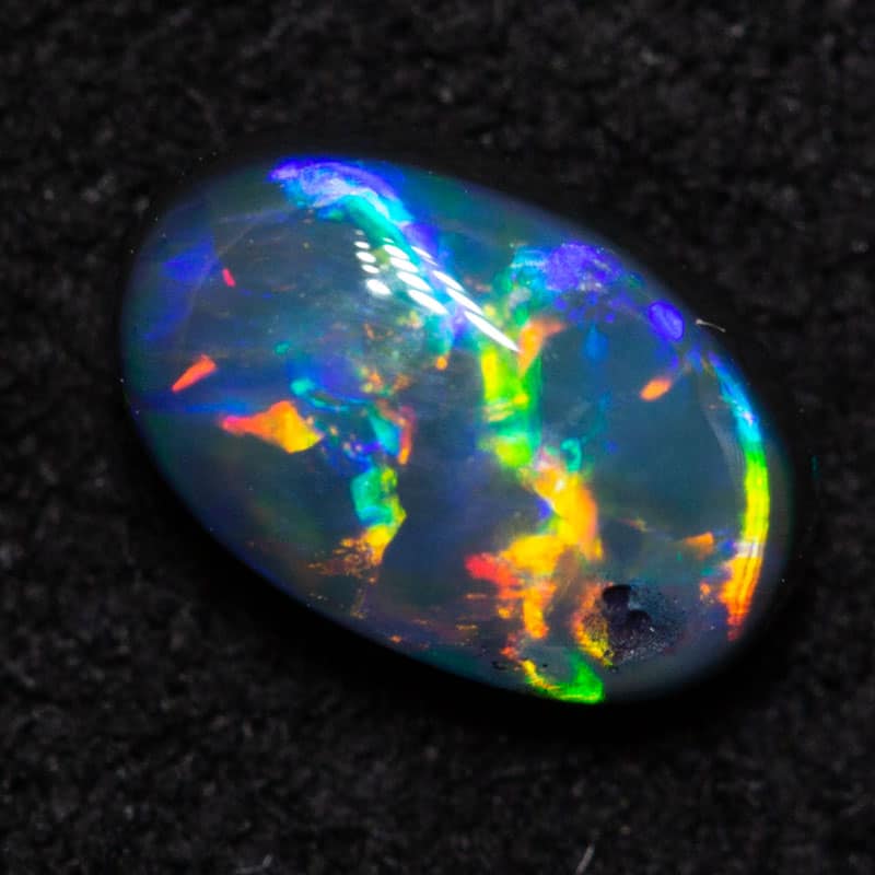 0.52ct black opal 6.5x4x2.5mm