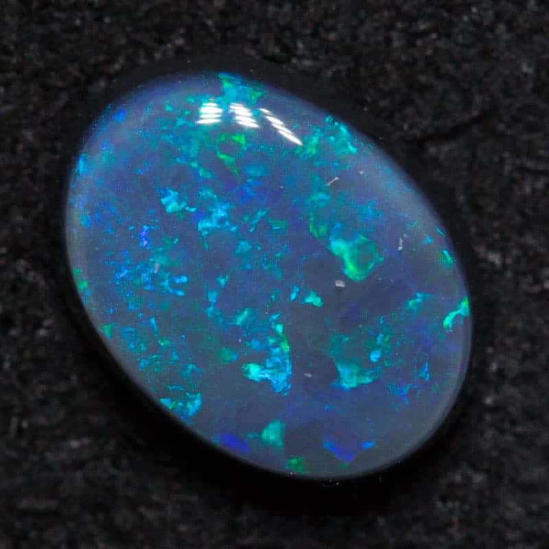 0.53 ct black opal 6.5x5x2.4mm