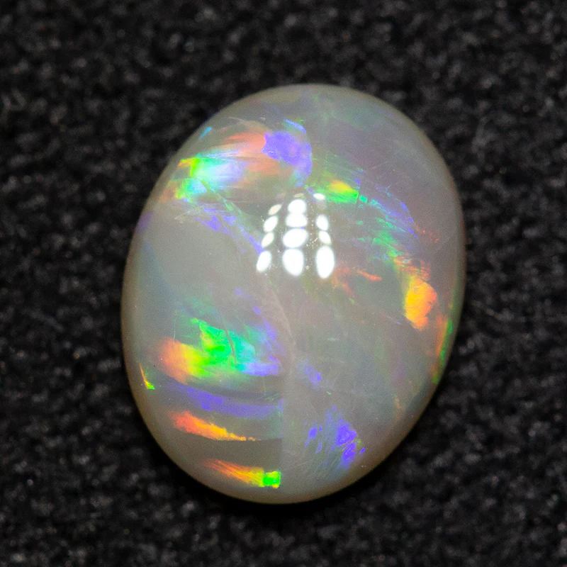 0.53 ct dark opal 6.5x5.2x2.5mm