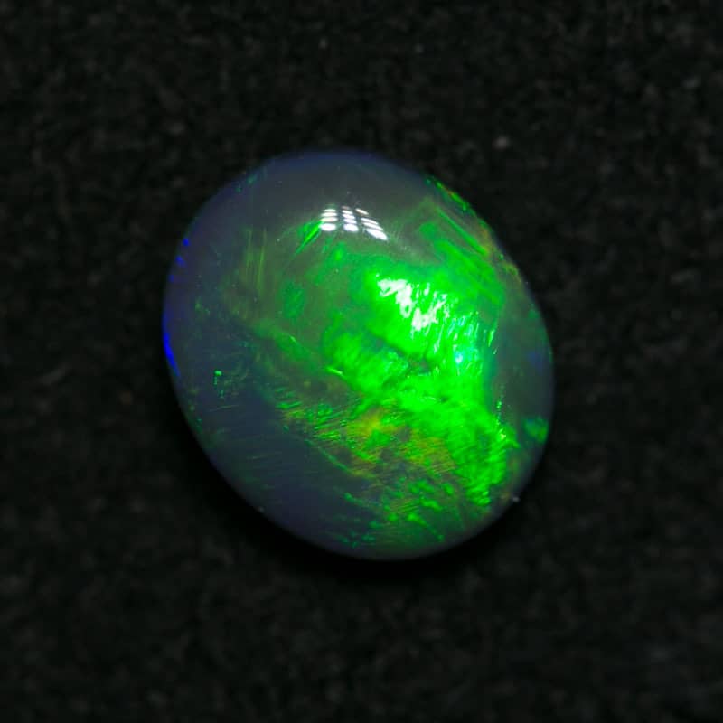 0.53 ct dark opal 6x5x2mm