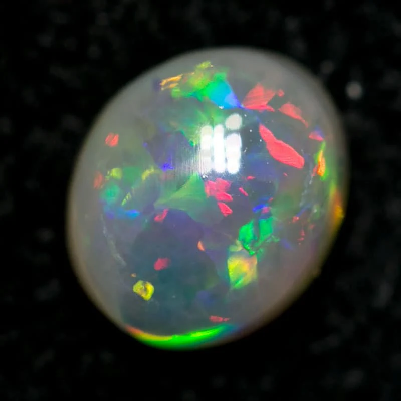 0.53 ct dark opal 6x5x3mm