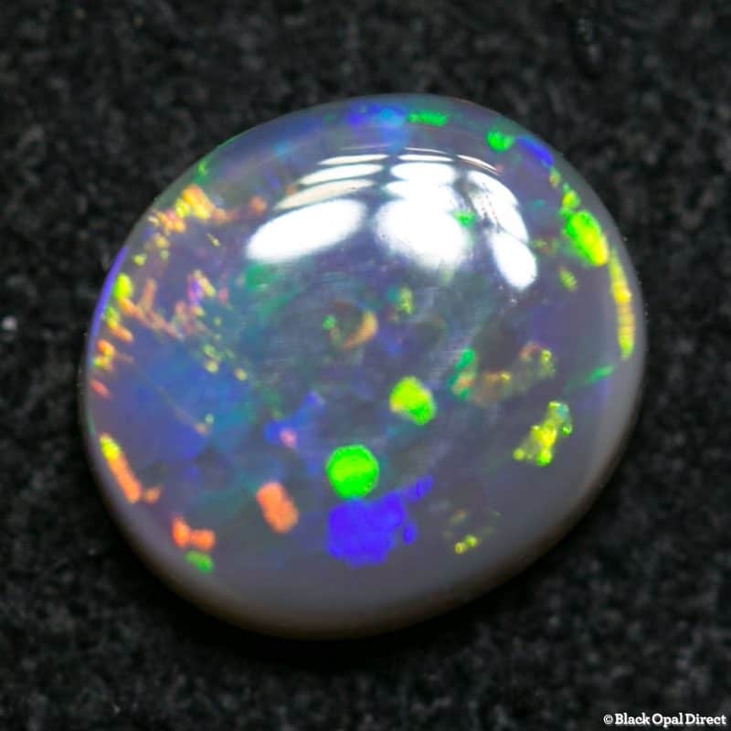 0.54 ct dark opal 6x5x2mm