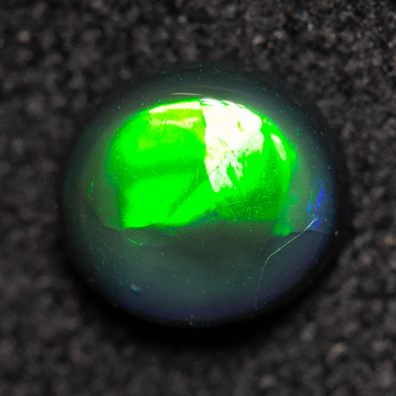 0.55 ct black opal 5.9x5.3x2.5mm
