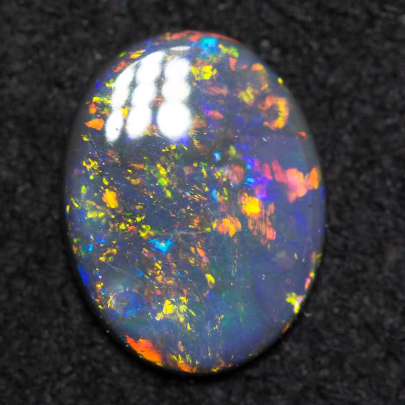 0.55 ct black opal 8.5x6.6x1.4mm