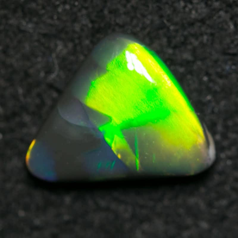 0.55 ct black opal baroque 7x6x2mm
