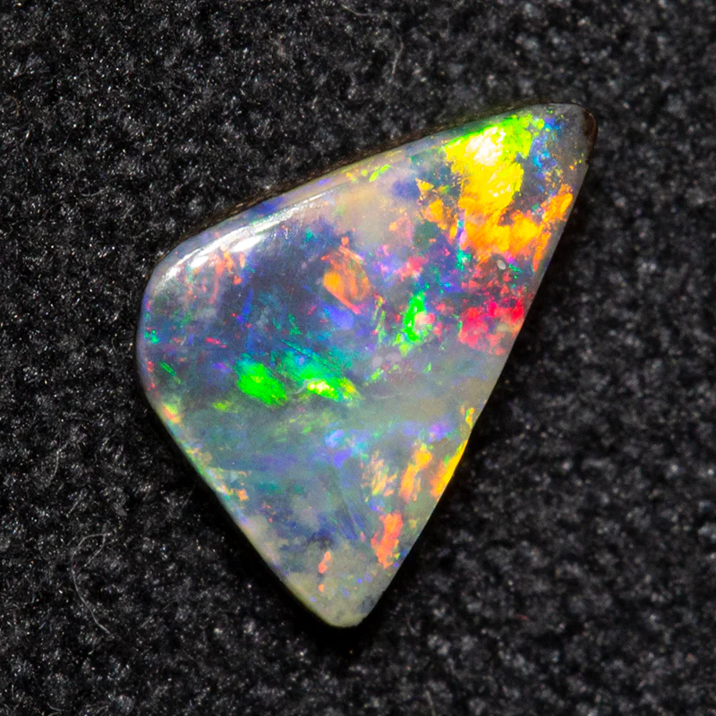 0.55 ct boulder opal 7.2x4.6x2.1mm
