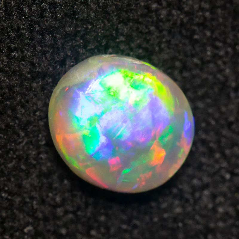 0.55 ct crystal opal 6.1x5.4x2.8mm