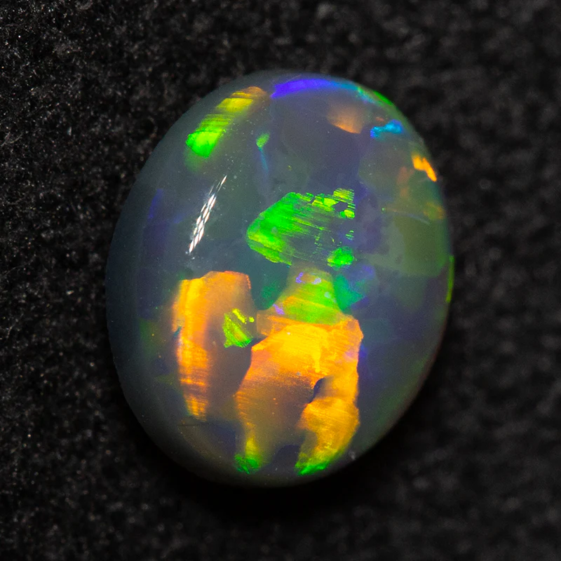 0.55 ct dark opal 6x5x2mm