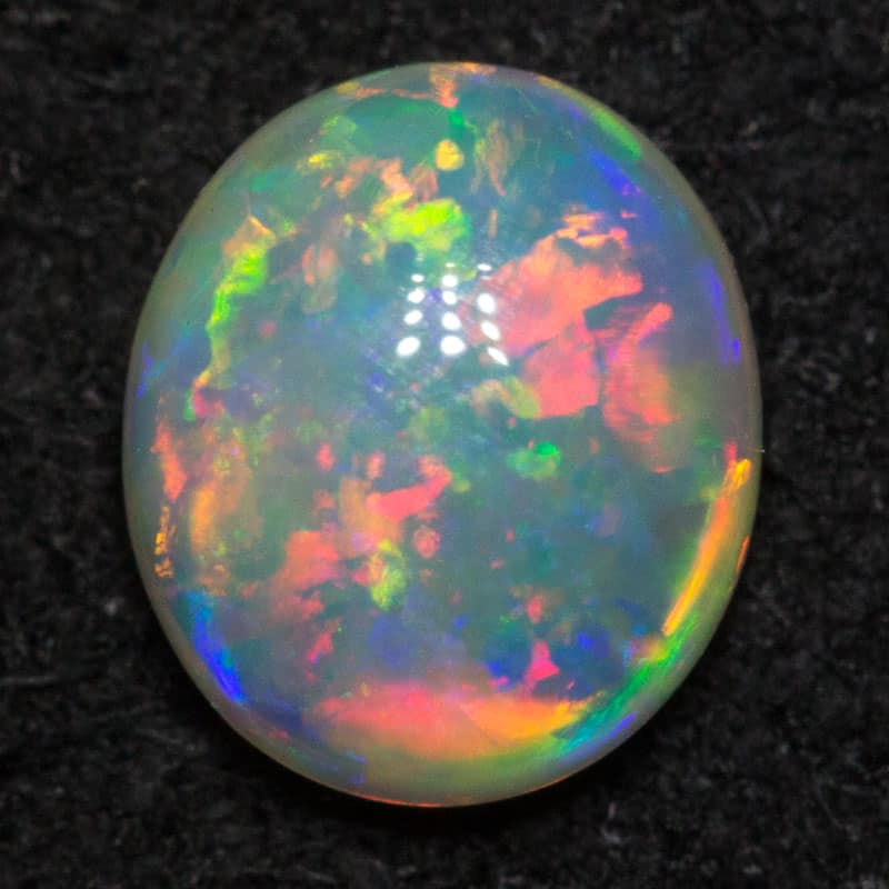 0.55 ct double sided crystal opal 6.1x5.2x2.8mm