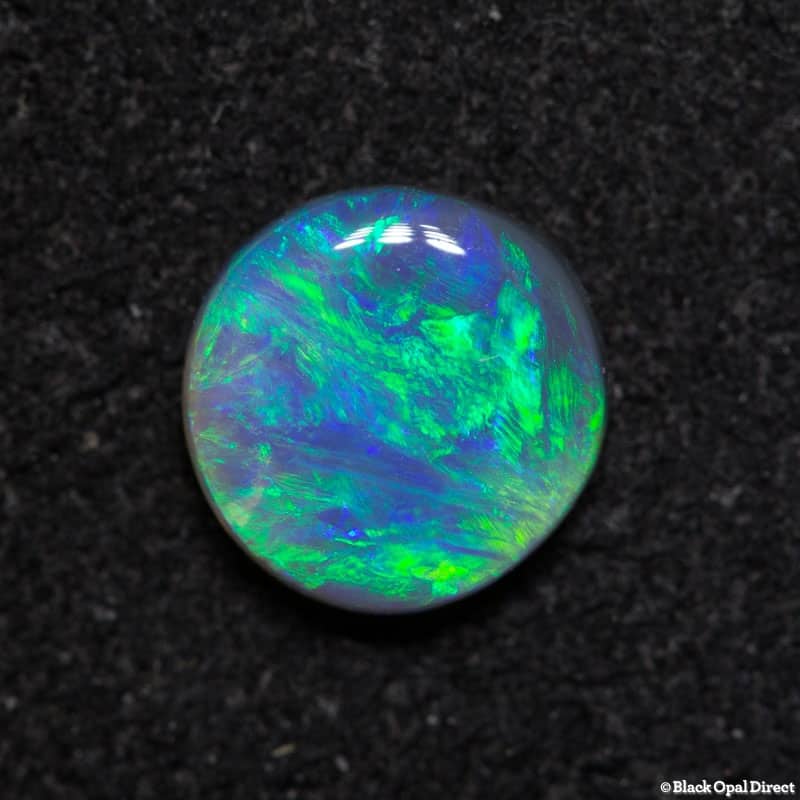 0.55 ct semi black opal 6mm round x 2mm thick