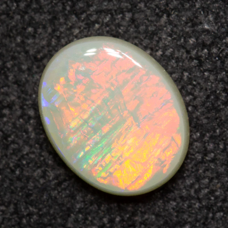 0.55 ct white opal 6.6x5.3x2.2mm