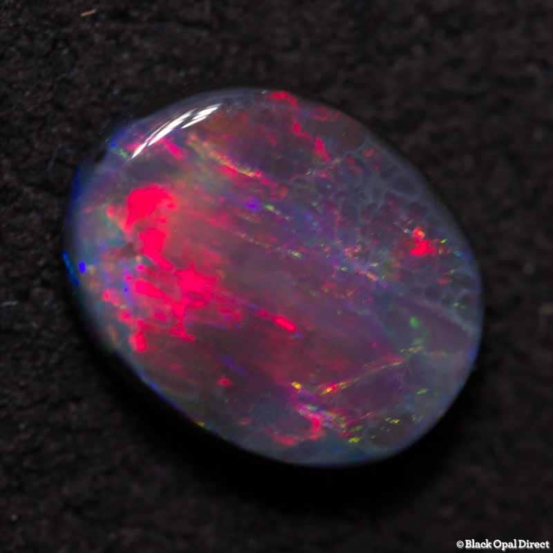 0.56 ct black opal 6.5x5x2mm