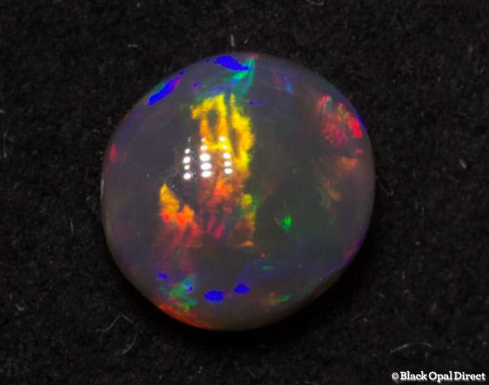 0.56 ct semi black opal 5.5x5x3mm