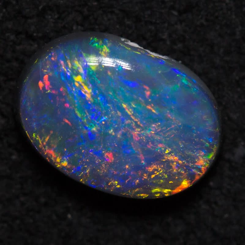 0.56ct black opal 6.6x4.8x2.4mm