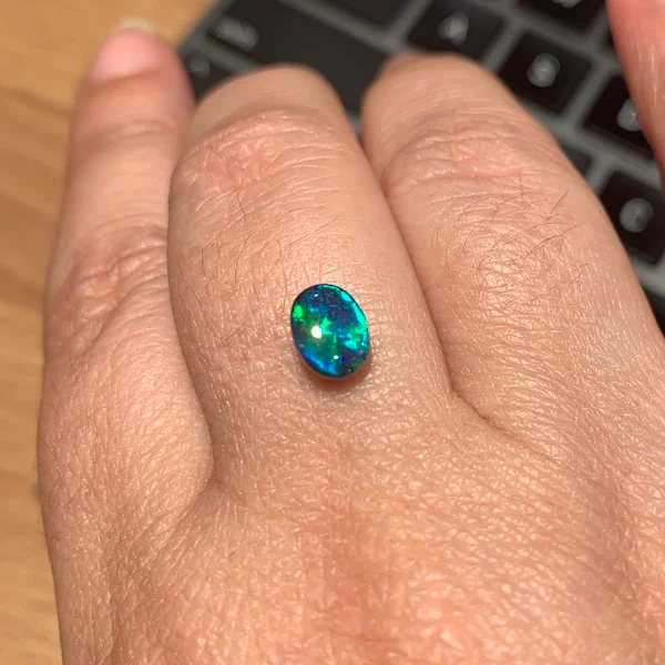 0.56ct black opal 7.4x5.5x2mm