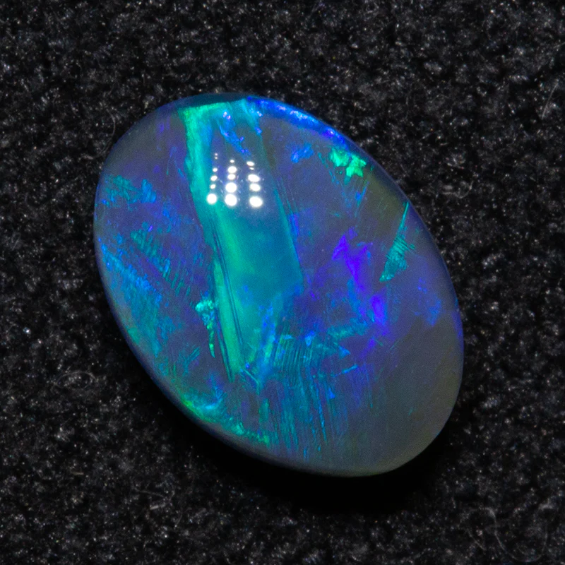 0.57 ct black opal 6.5x4.7x3mm