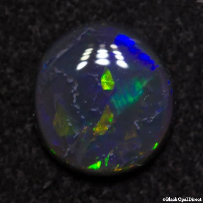0.57 ct black opal 6.5x6x2mm