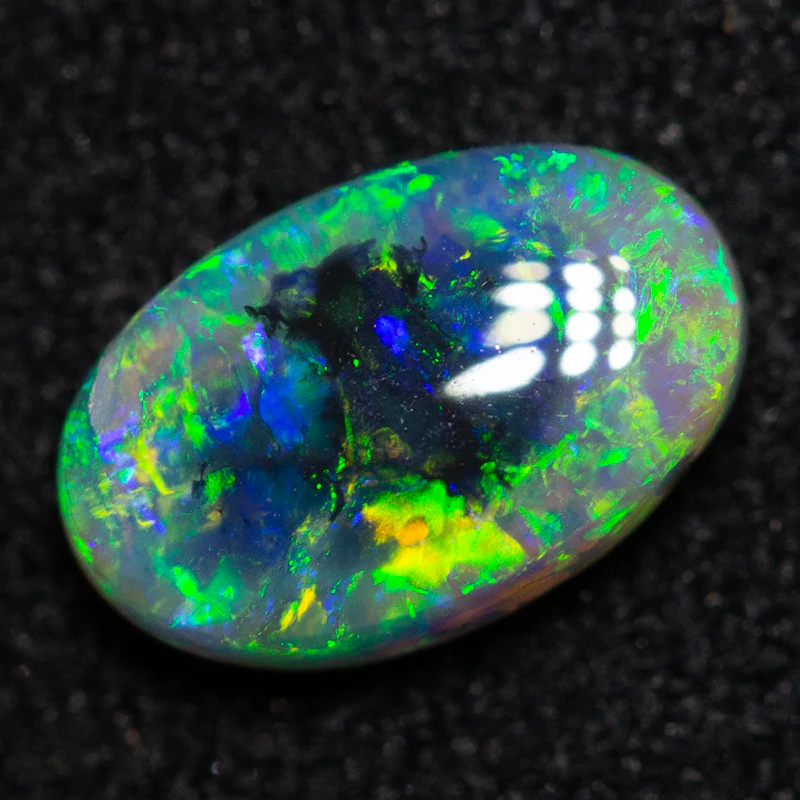 0.57 ct black opal 7.4x4.7x2.4mm