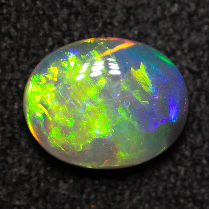 0.57 ct dark crystal opal 6.6x5.3x2.5mm