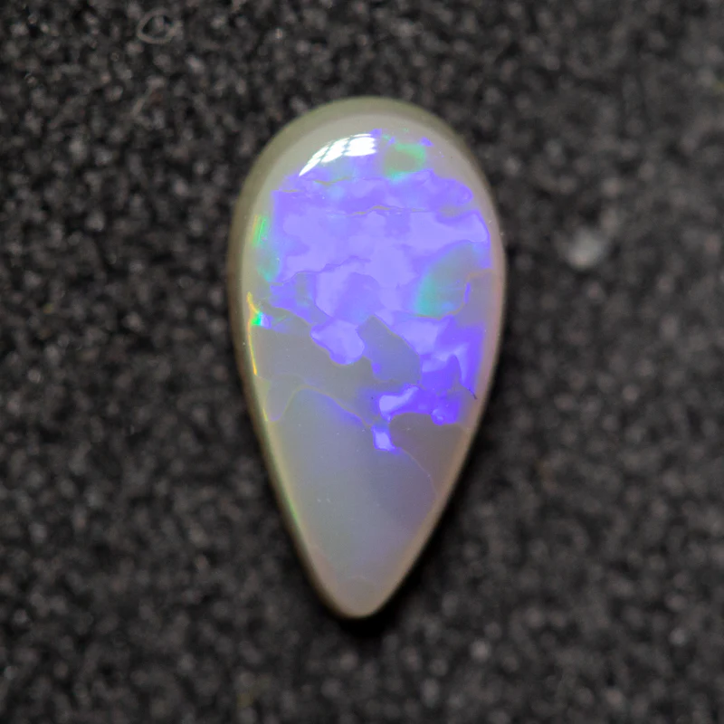0.57 ct dark opal 8.2x4.4x2.5mm
