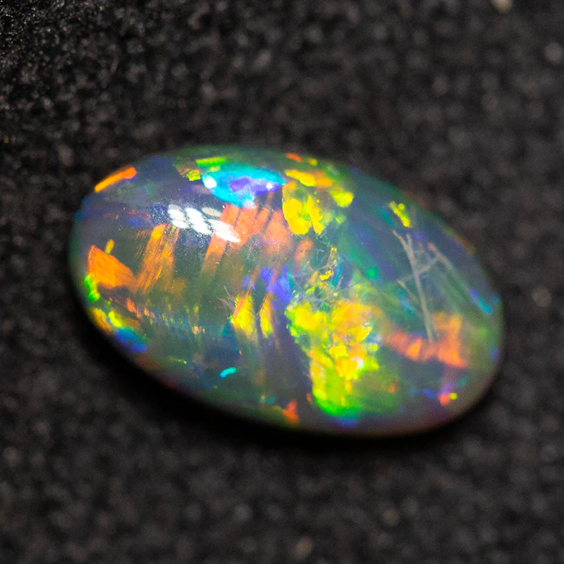 0.58 ct black opal 7.3x4.4x2.8mm