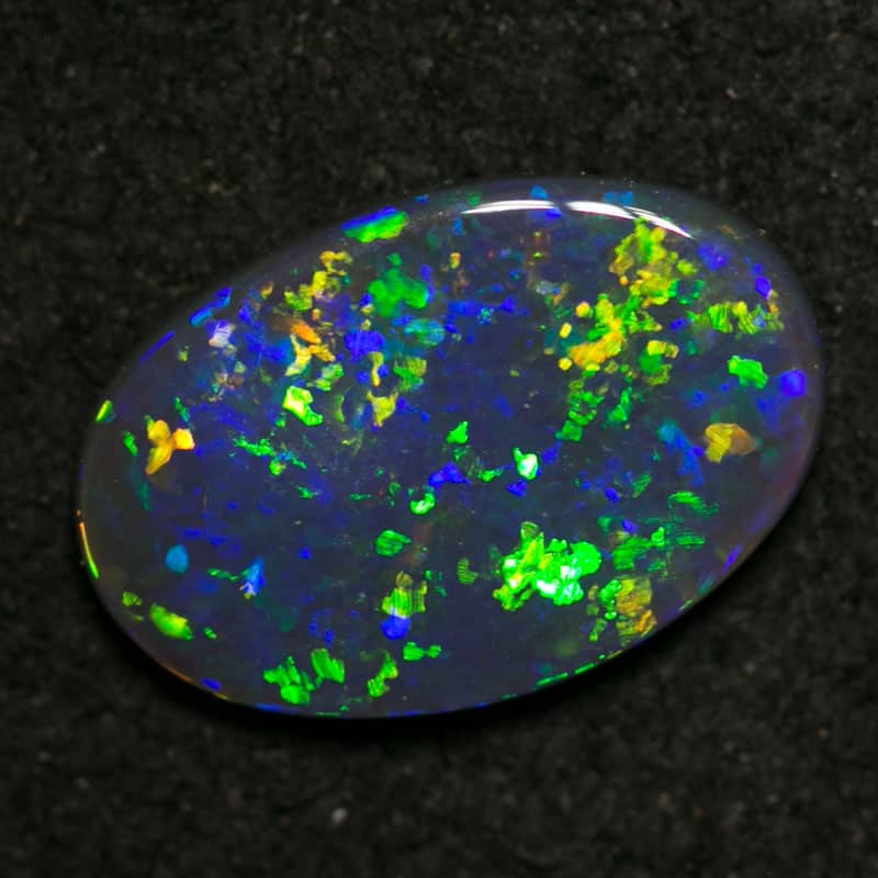 0.58 ct black opal 9x6x1mm