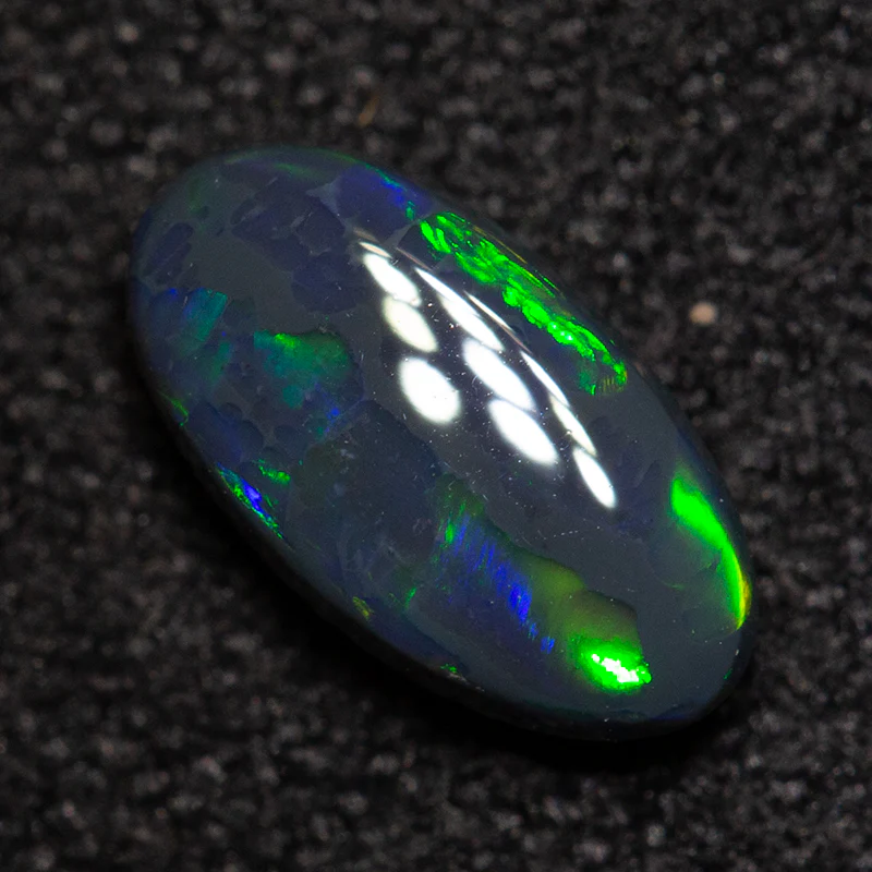 0.59 ct black opal 7.8x4.2x2.7mm