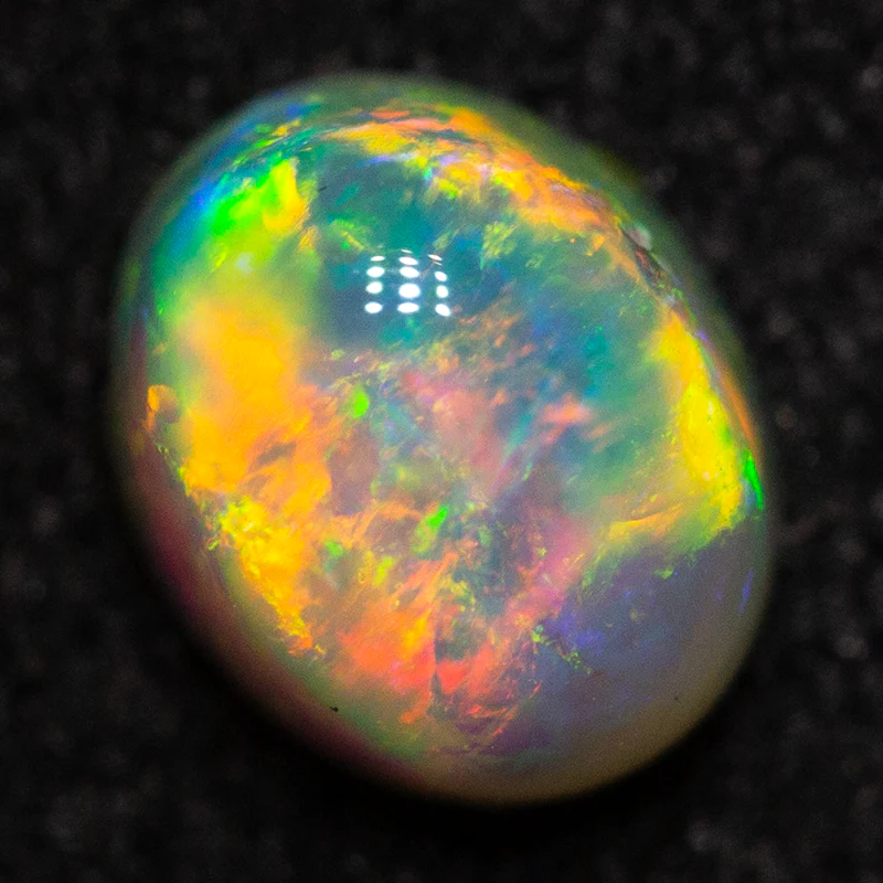 0.59 ct crystal opal 5.6x4.6x3.6mm