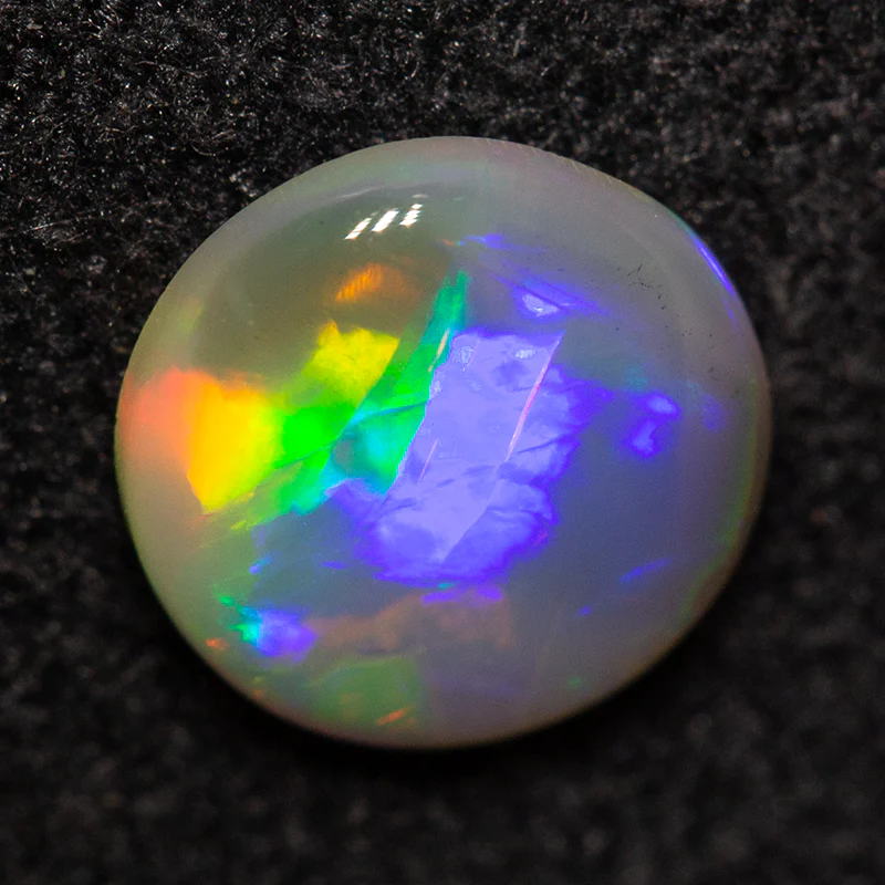 0.59 ct crystal opal 6.6x6.5x2.1mm