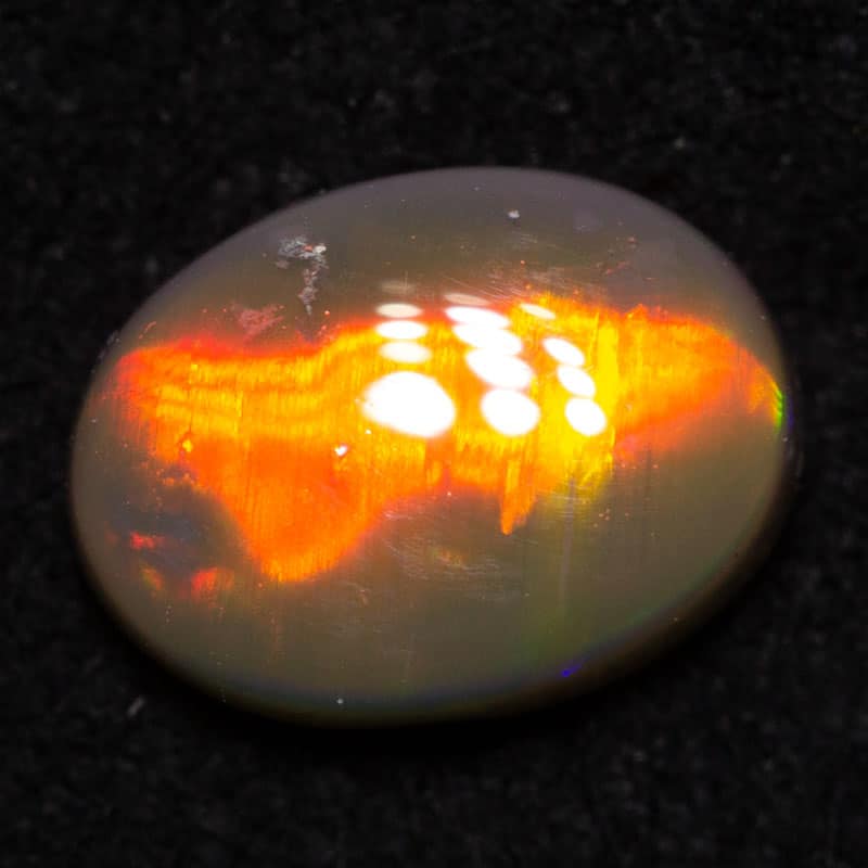 0.59ct black opal 7x5x2.5mm