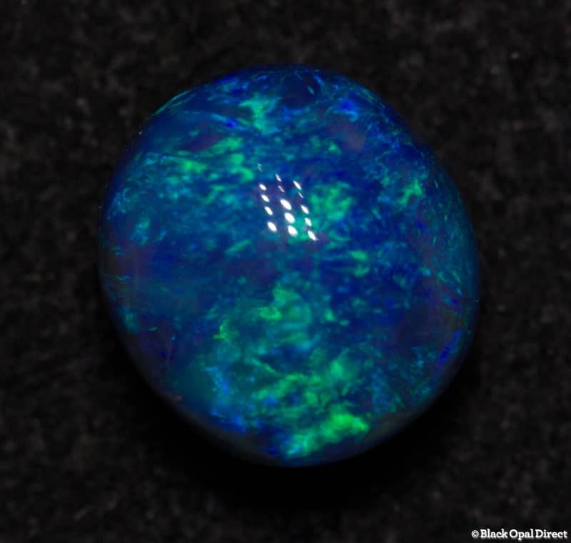 0.60 ct black opal 5.5x5x3mm