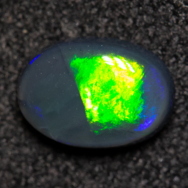 0.60 ct black opal 6.8x4.8x2.6mm