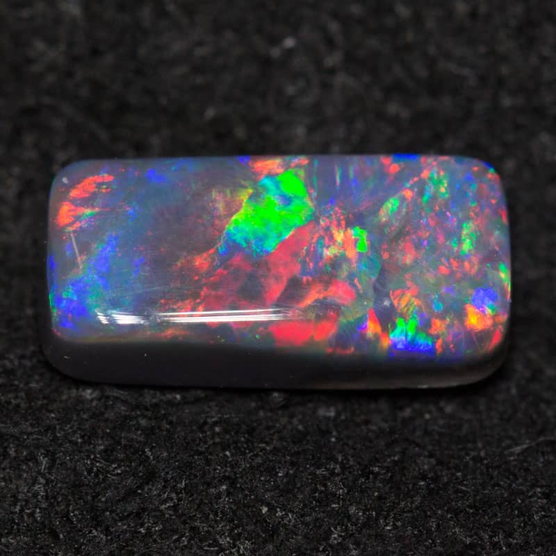 0.60 ct black opal 8.1x3.8x2.1mm