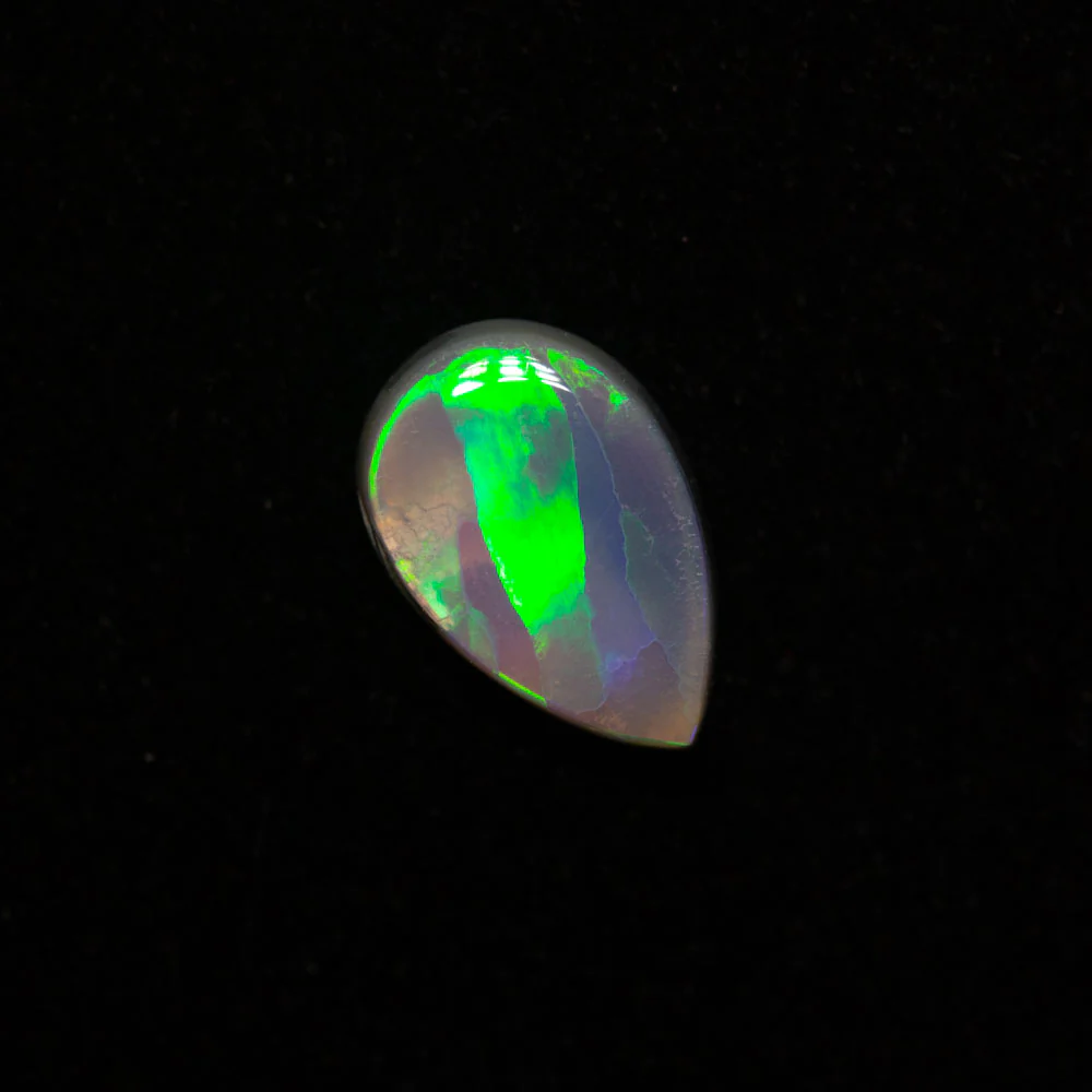 0.60 ct dark opal 7.8x5.1x2.2mm
