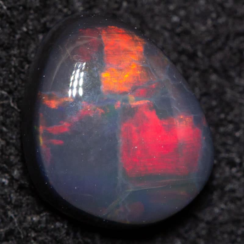 0.60ct black opal 6.5x5.4x3mm
