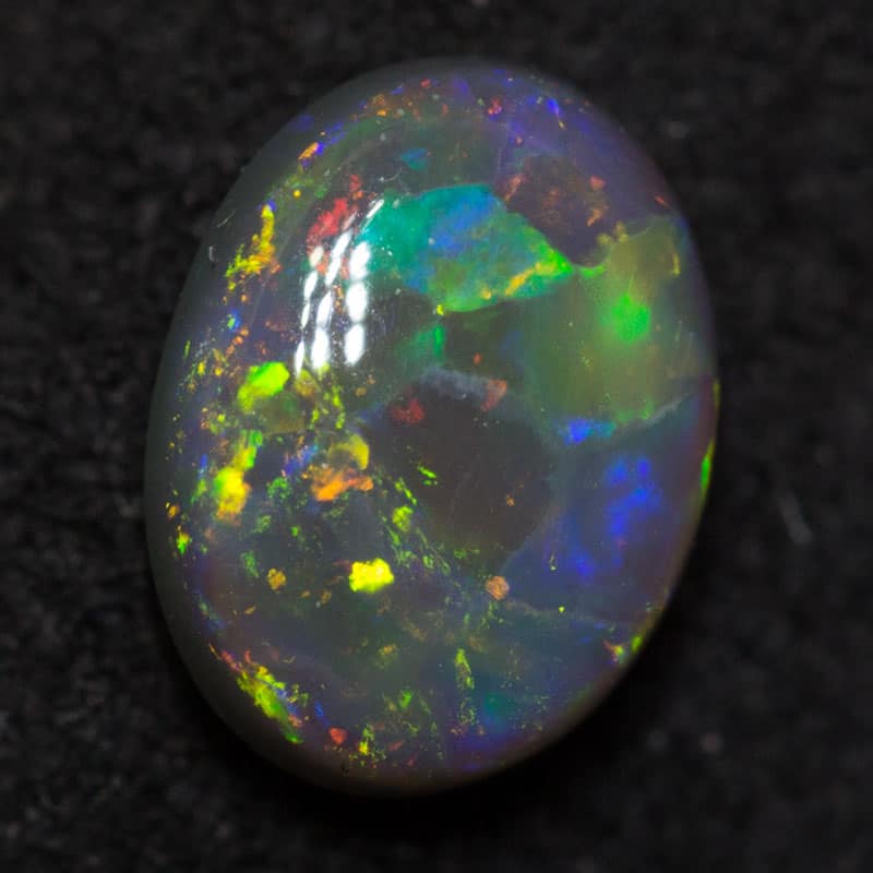 0.61 ct black opal 6.7x5x2.8mm