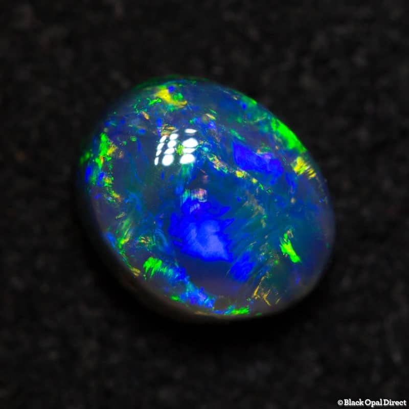 0.61 ct black opal 6.8x5.8x3mm