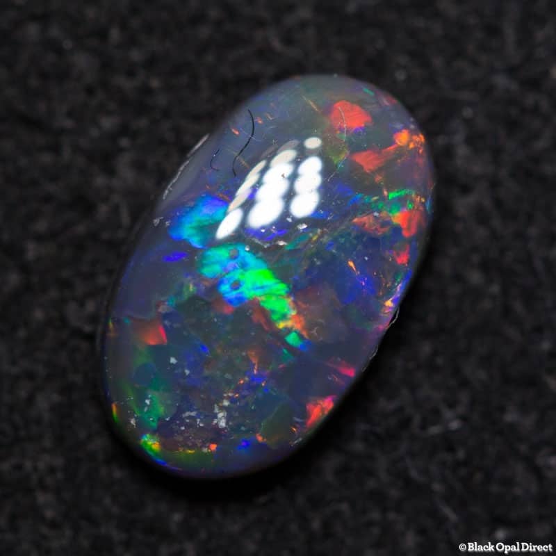 0.61 ct black opal 7.5x4.5x2mm