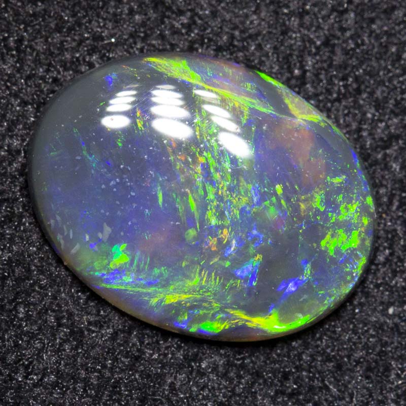 0.61 ct black opal 8.7x6.6x1.6mm
