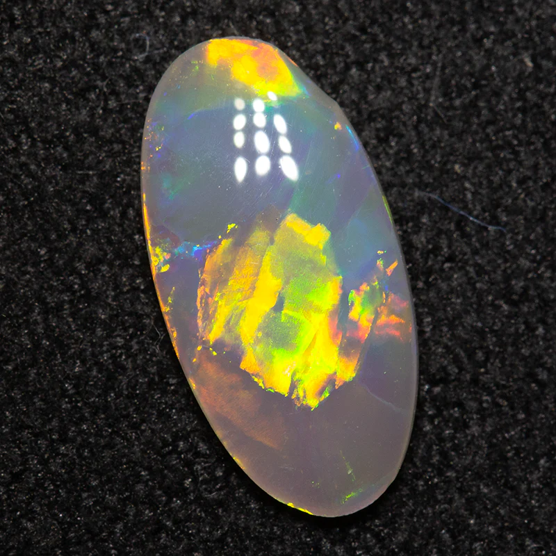 0.61 ct dark opal 11x5x1.5mm