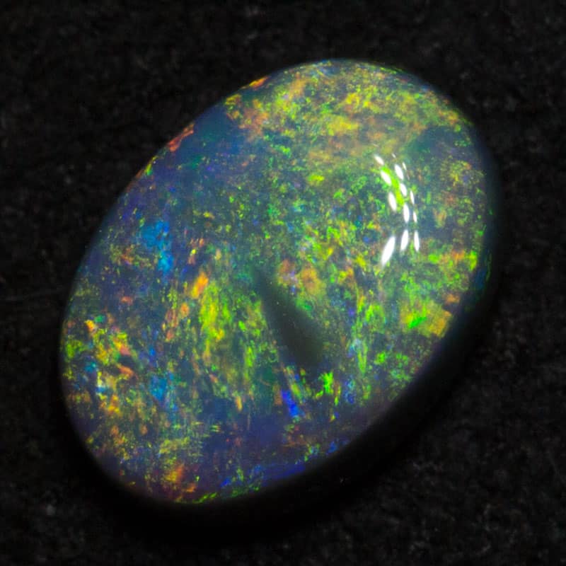 0.62 ct black opal 6.7x4.9x2.6mm