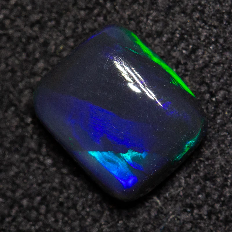 0.62 ct black opal 6x5x2.6mm