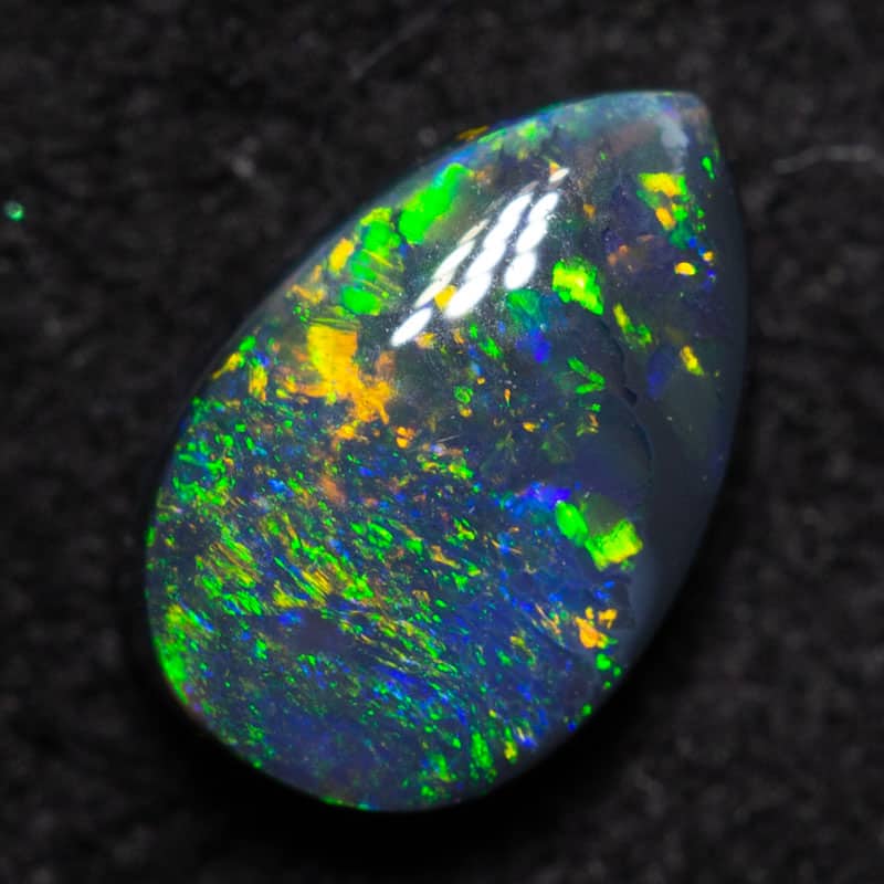 0.62 ct black opal 7.2x4.7x2.9mm
