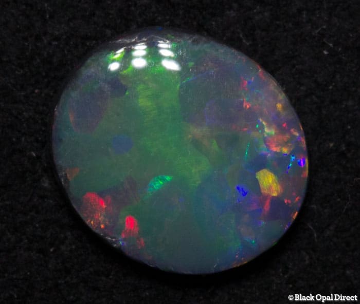 0.62 ct black opal 7.5x6.5x2mm